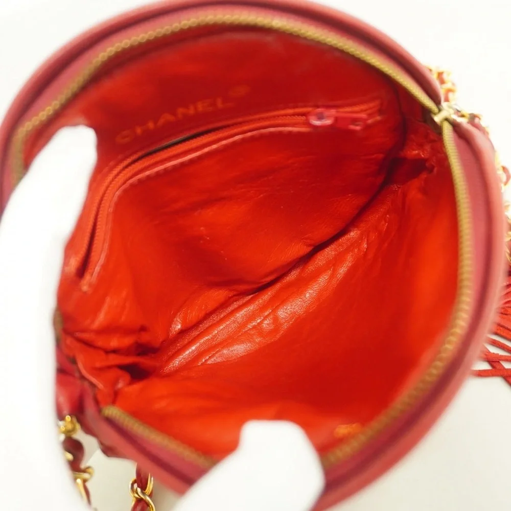 Authentic CHANEL RED LAMBSKIN tassel round mini vintage bag